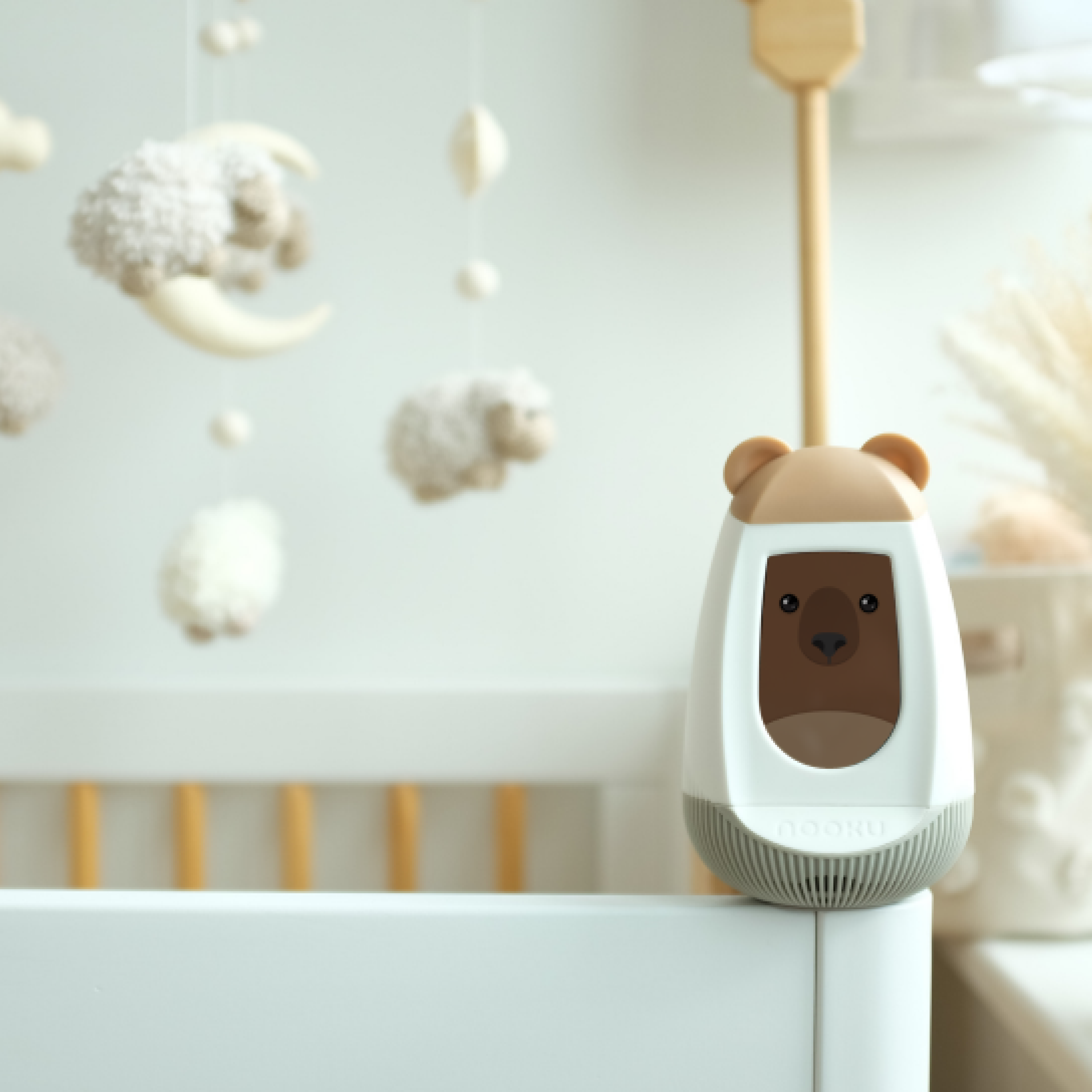 Baby interacting with nooku device
